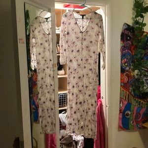 This Is a long white dress with pink flowers from forever 21 size small